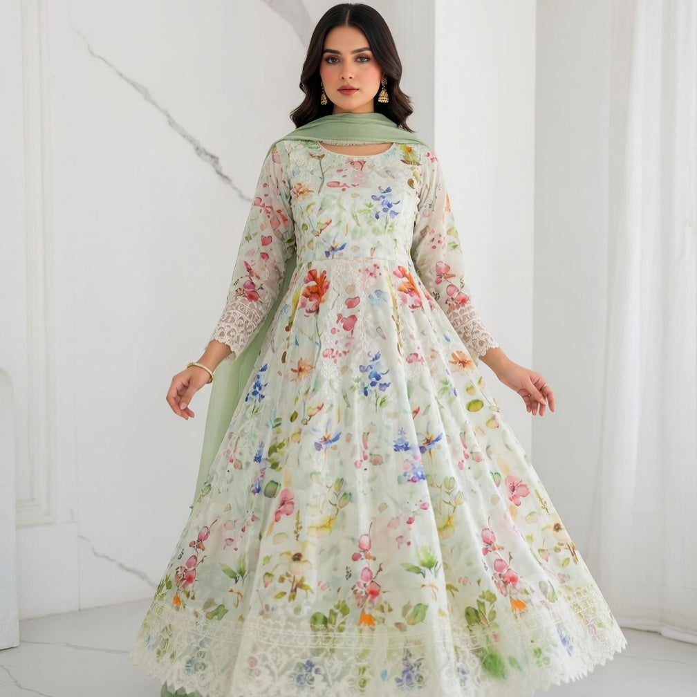 Woman wearing a floral dress with a green scarf against a white background